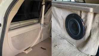 The inside of the back of a car on one side of the image, a speaker installed into upholstery on the other